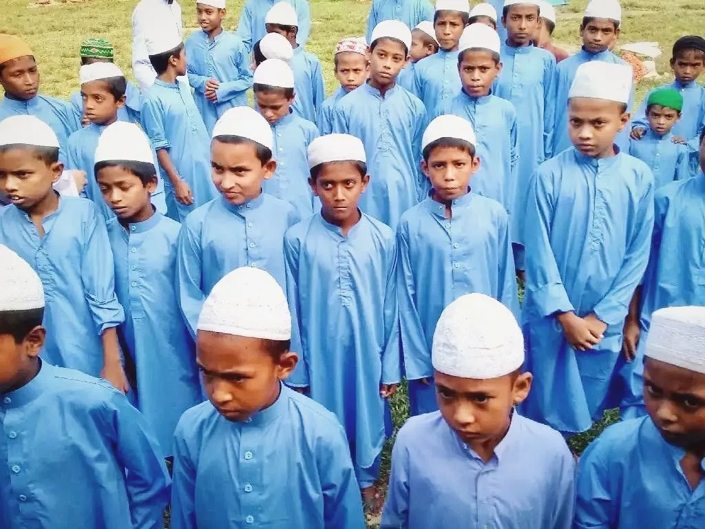 Group of students in blue uniforms